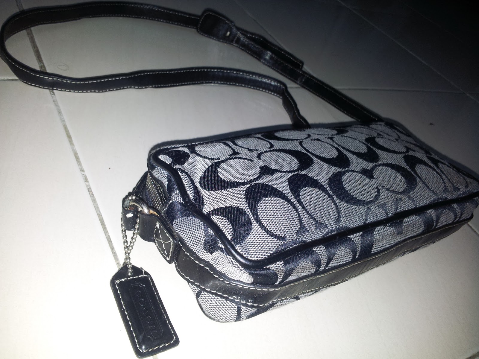 coach mobile sling bag
